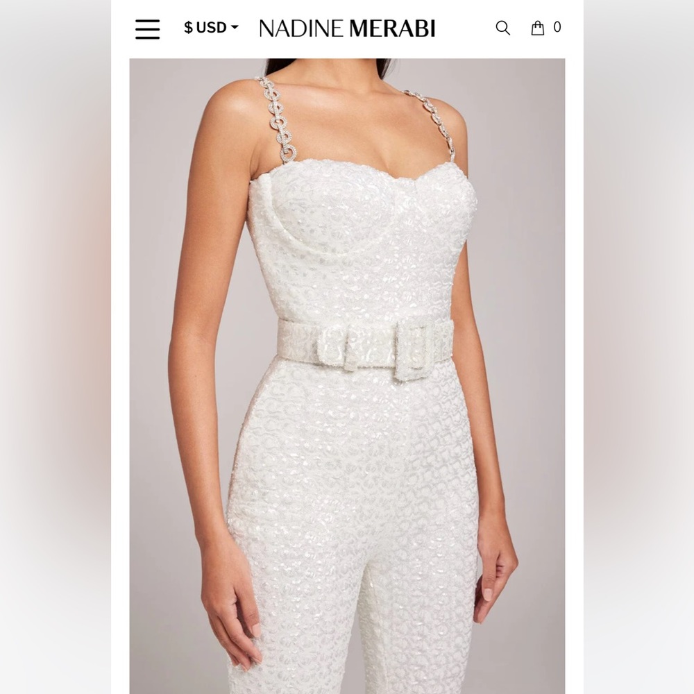 Bought for wedding and didn’t end up wearing. Never been worn. Beautiful piece